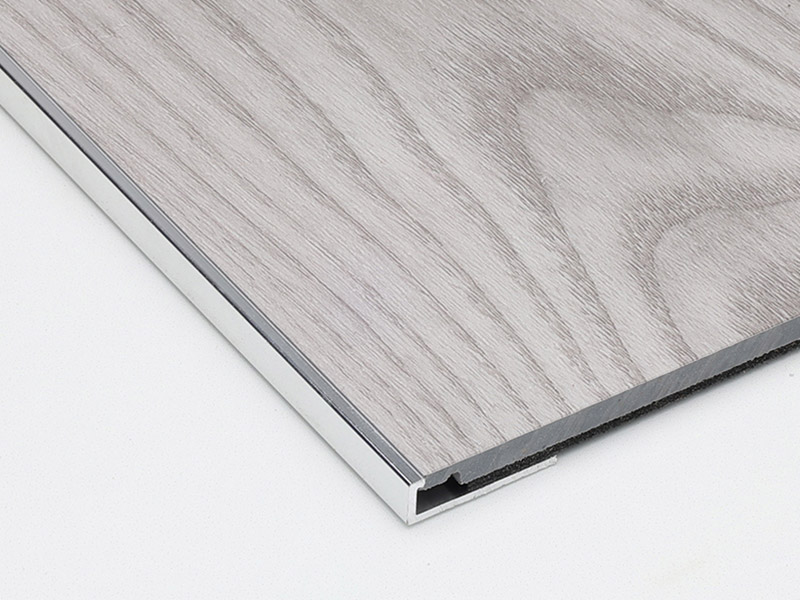 Отделка края напольного покрытия C-каналом